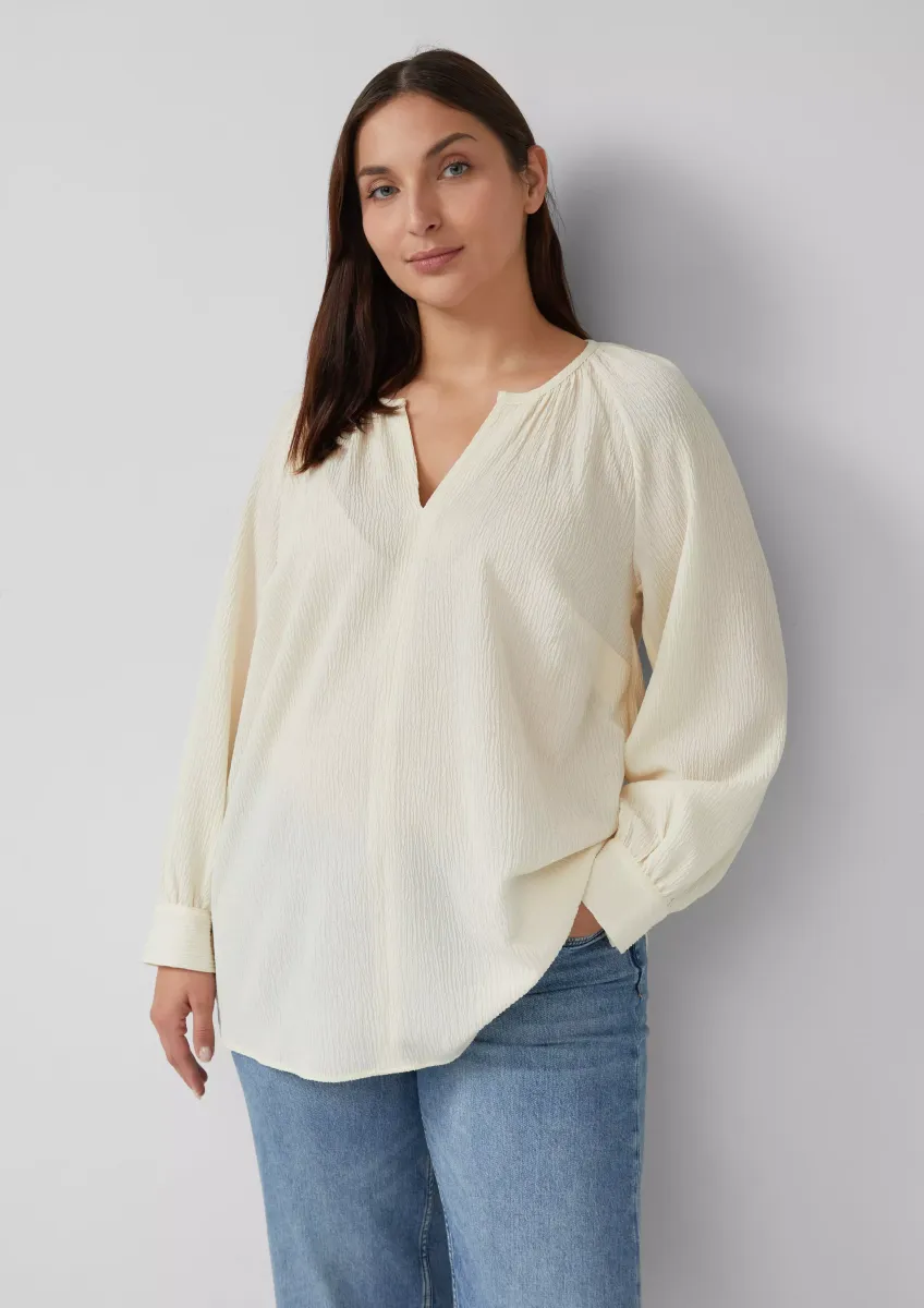 Elastische strukturierte Bluse mit weitem Arm