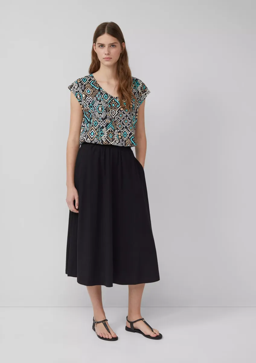 Jersey-Midirock mit Eingrifftaschen