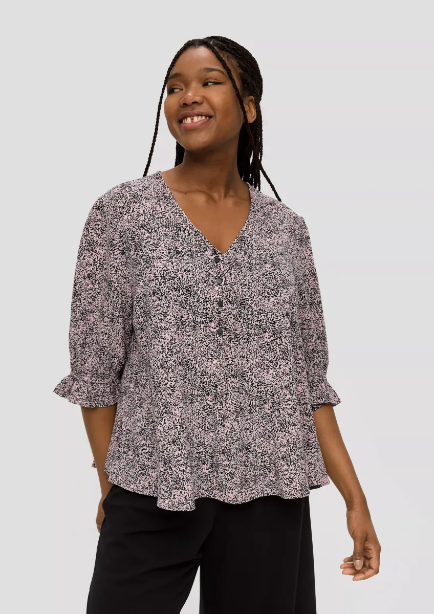 Kurze, gemusterte Bluse mit Raffung