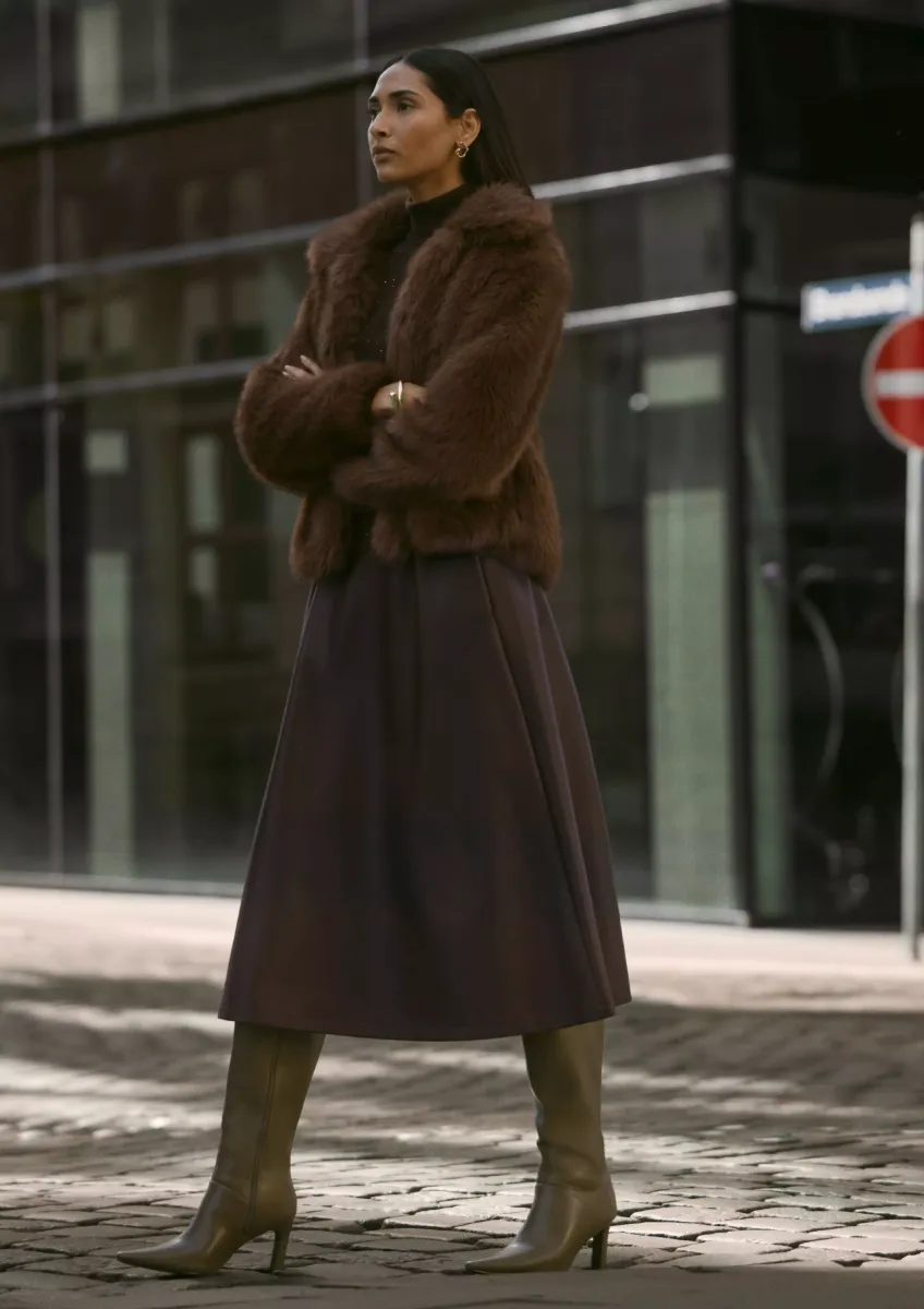 Midirock in Leder-Optik mit ausgestelltem Saum