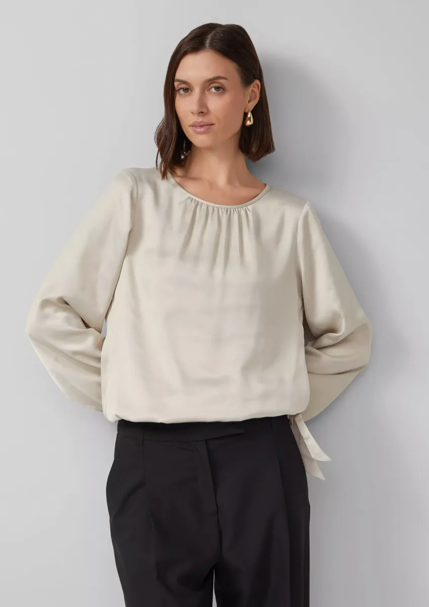 Satin-Bluse mit Binde-Detail am Saum