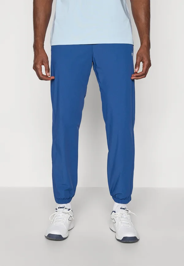 ACE TRACK PANTS - Jogginghose - estate blue