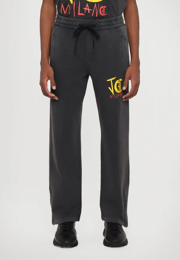 ACID LEOPARD - Jogginghose - black