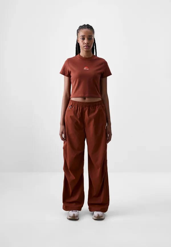 ACTIVITORIUM PANT - Jogginghose - cinnamon/picante red/summit white
