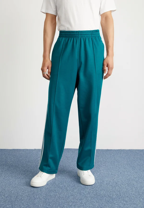 ADICOLOR BAGGY FIT FIREBIRD TRACK PANTS - Jogginghose - legacy teal