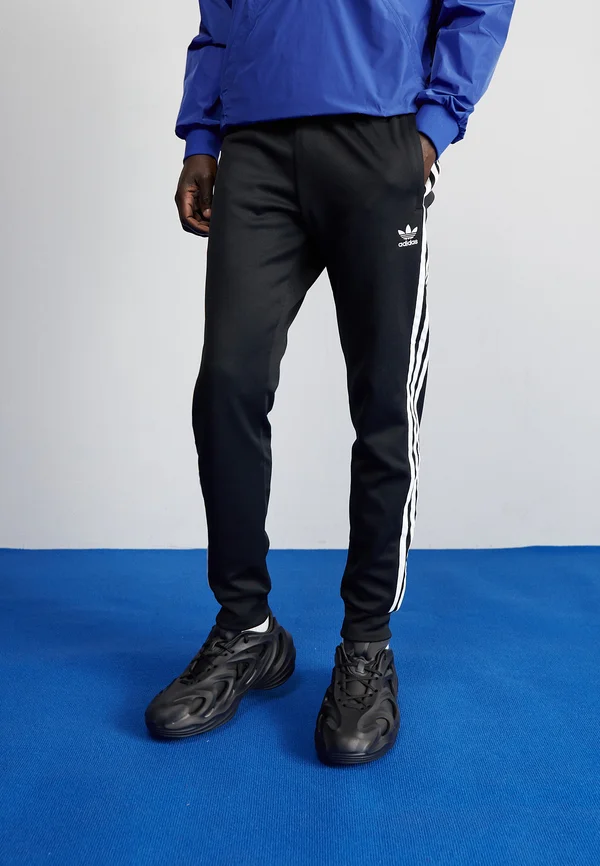 ADICOLOR CLASSICS SUPERSTAR TRACK PANTS - Jogginghose - black/white