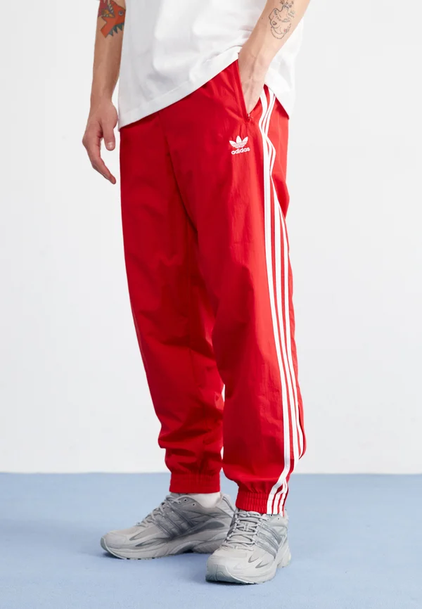 ADICOLOR WOVEN FIREBIRD TRACK - Jogginghose - better scarlet