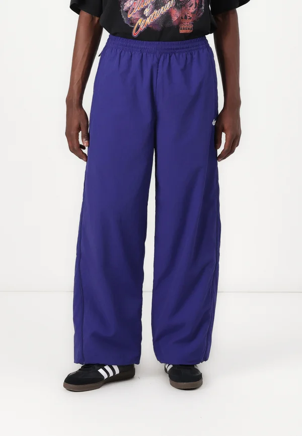 ADILENIUM SEASONAL 3 OVERSIZED SUPERSTAR TRACK - Jogginghose - night indigo