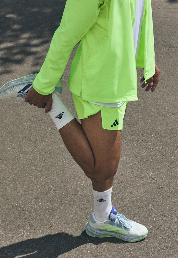 ADIZERO SPLIT SHORT - Kurze Sporthose - lucid lemon