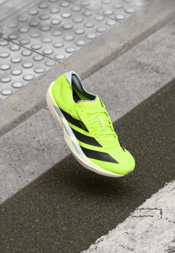ADIZERO TAKUMI SEN 11 - Laufschuh Straße - lucid lemon/core black/halo silver-coloured