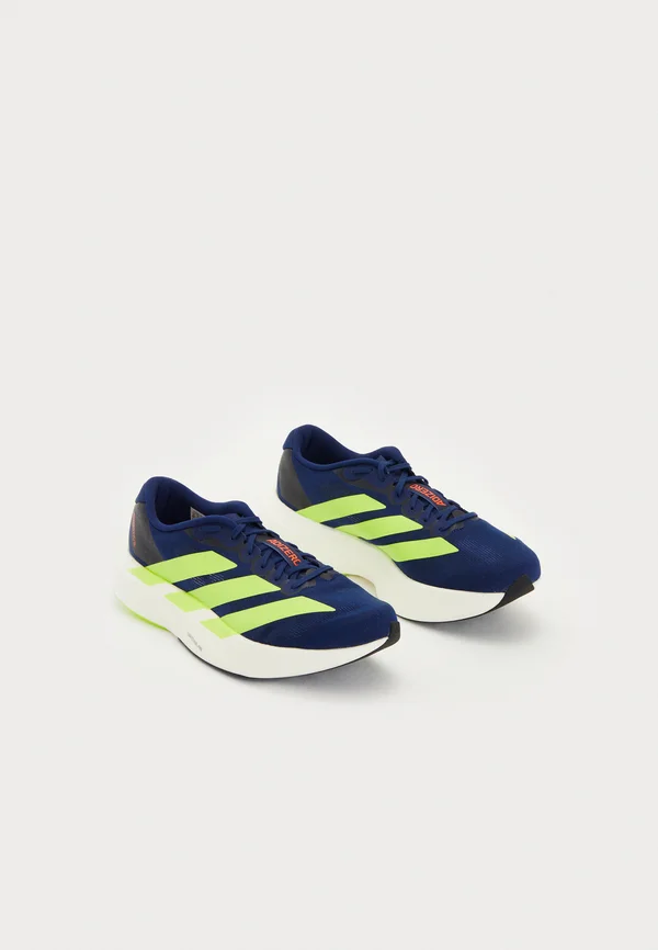 ADIZERO UNISEX - Sneaker low - dark blue/solar slime/lucid red