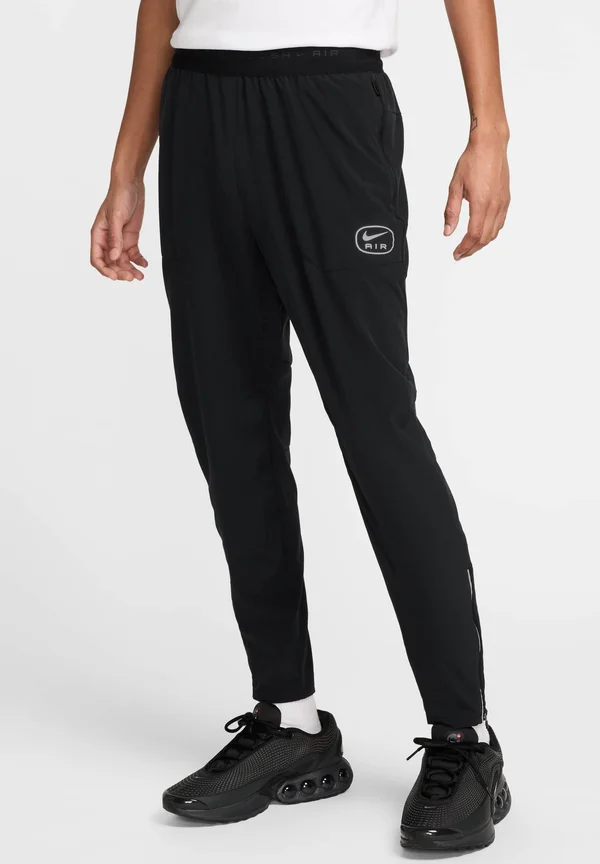 AIR - Jogginghose - black
