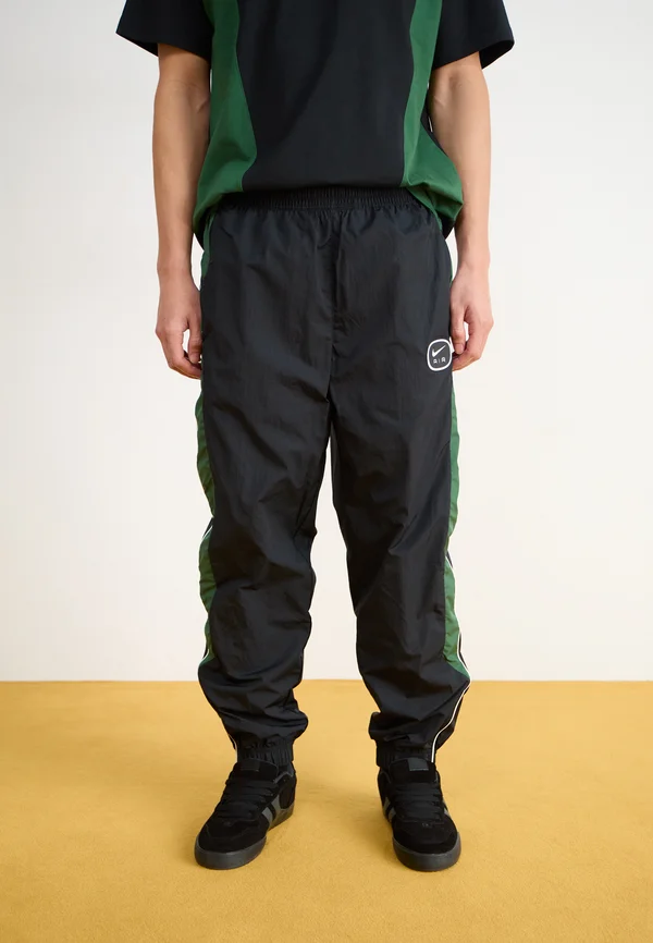 AIR PANT - Jogginghose - black/fir/white