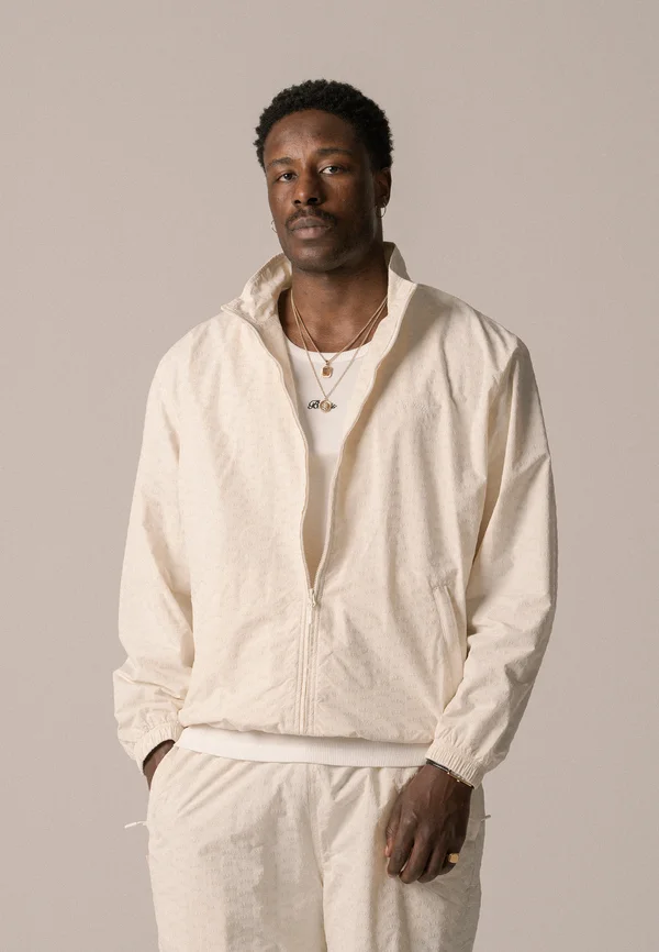 ALLOVER TRACK JACKET UNISEX - Trainingsjacke - antique white