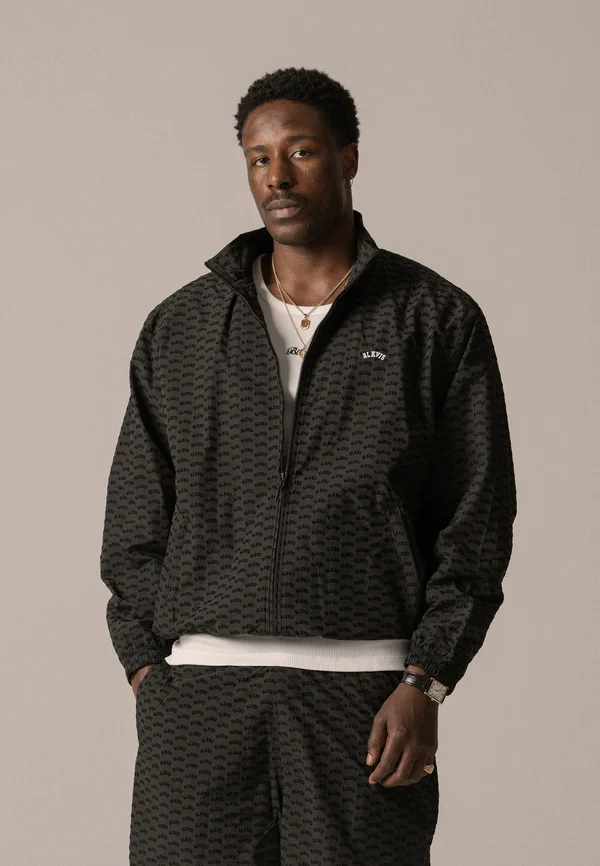 ALLOVER TRACK JACKET UNISEX - Trainingsjacke - black