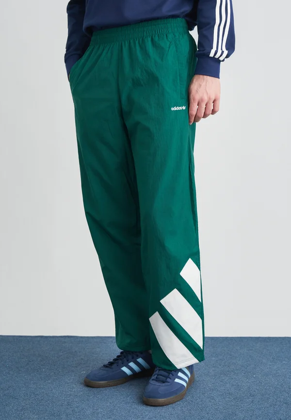 ARCH TRACK PANT - Jogginghose - collegiate green/white