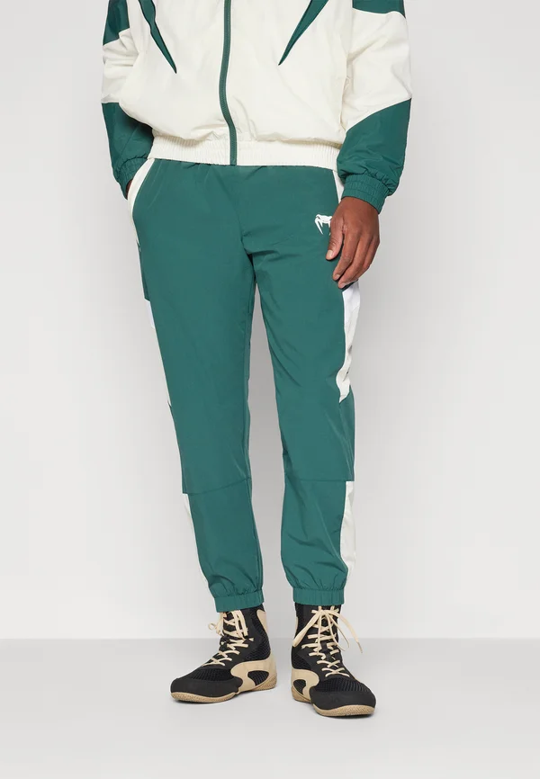 ATTACK 90 JOGGERS - Jogginghose - forest green/ice