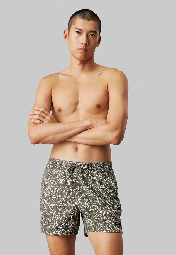 Badeshorts - zigzag logo green aop