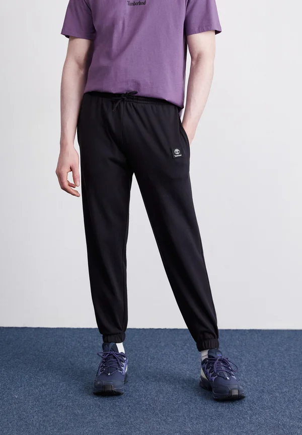 BADGE - Jogginghose - black