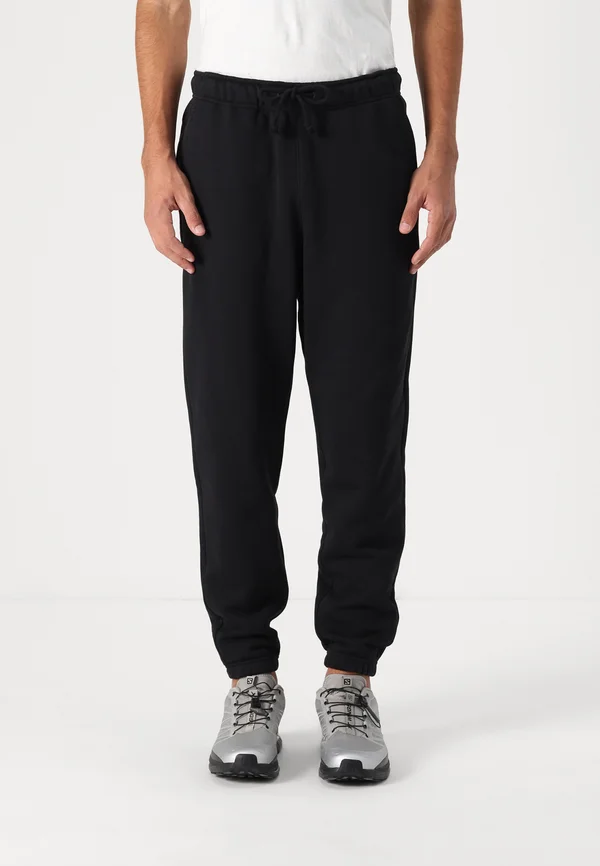 BADGE  - Jogginghose - black