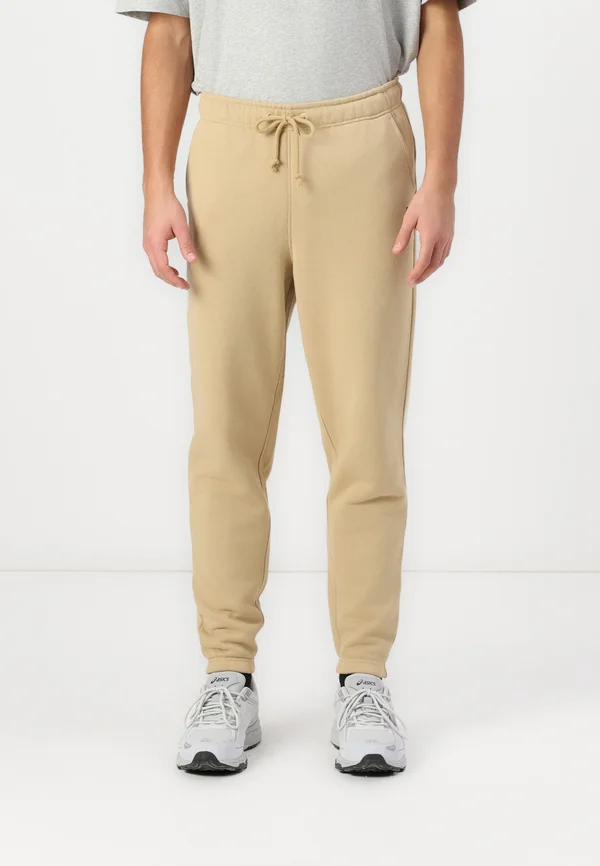 BADGE  - Jogginghose - relic tan