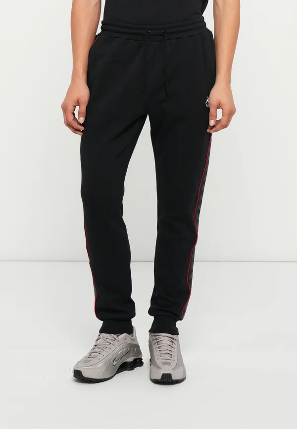 BANDA ALANZ - Jogginghose - black/red/white