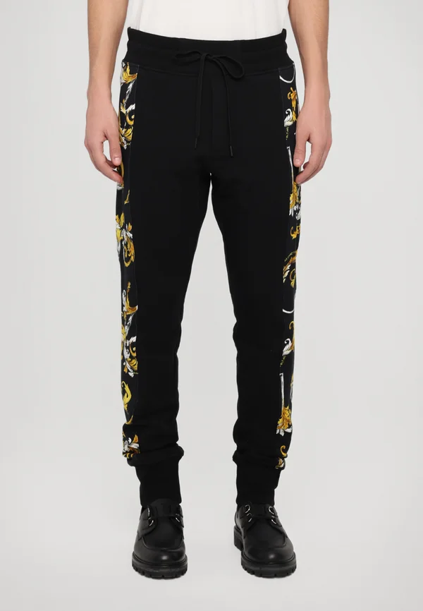 BAROCCO OUTLINE - Jogginghose - black/gold