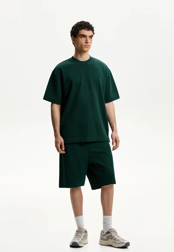 BERMUDA - Jogginghose - dark green