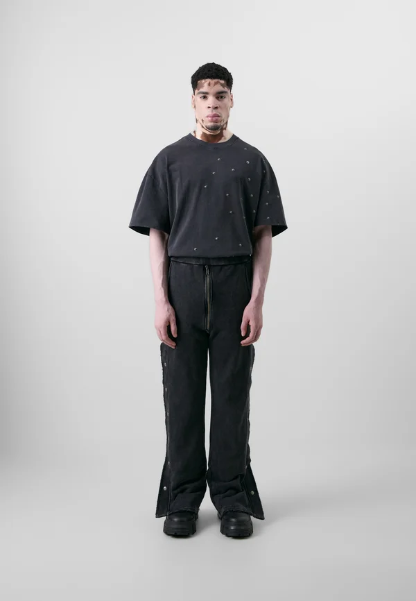BUTTON PANTS UNISEX - Jogginghose - black