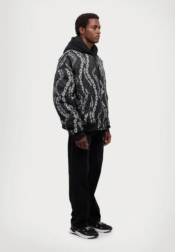 CHAINS - Daunenjacke - black