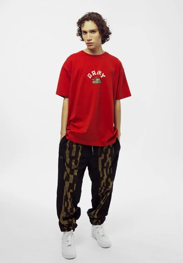 CHANDAL GRIMEY LUCKY DRAGON - Jogginghose - black