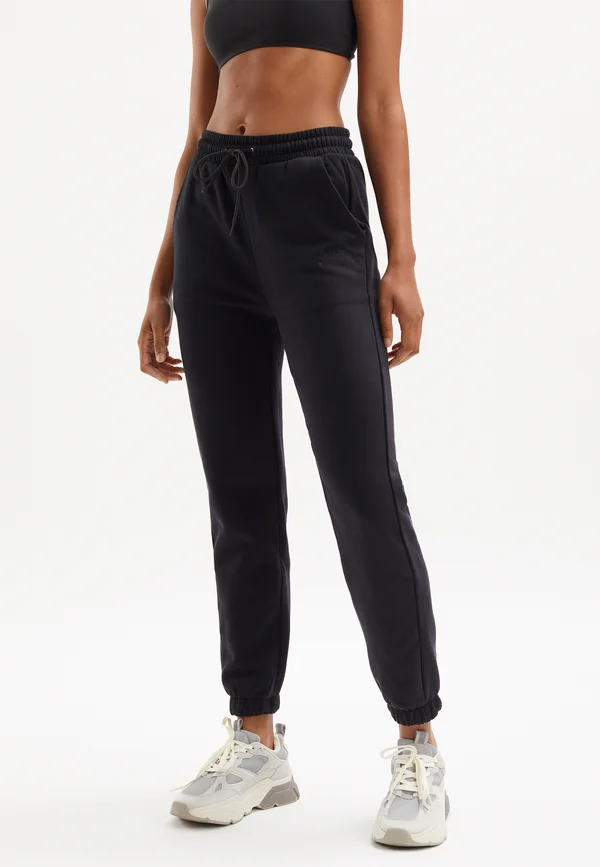 CHARLY  - Jogginghose - black