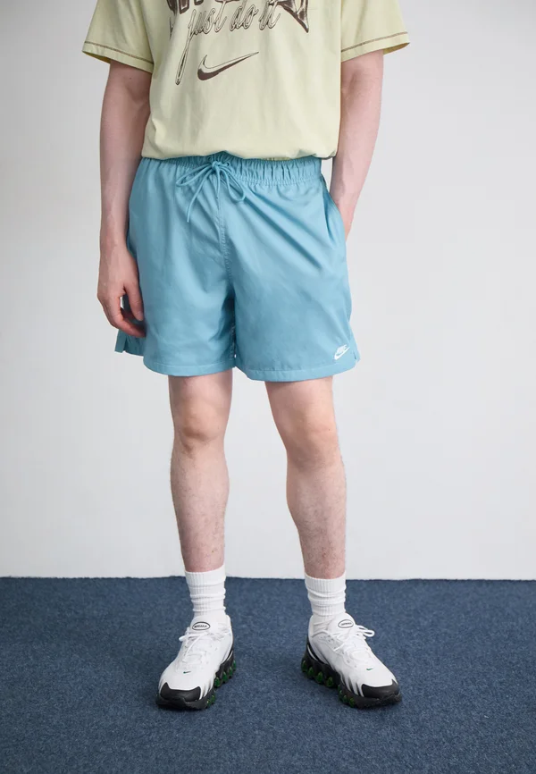 CLUB FLOW - Jogginghose - denim turquoise white