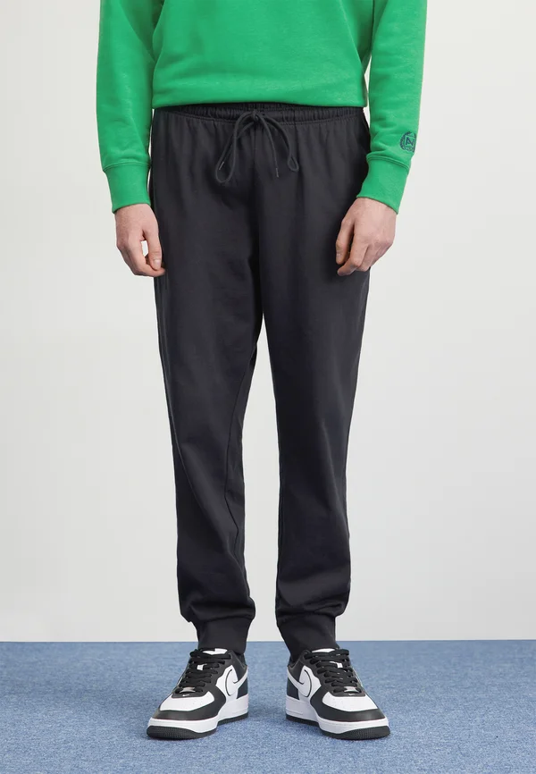 CLUB JOGGER - Jogginghose - black/(white)