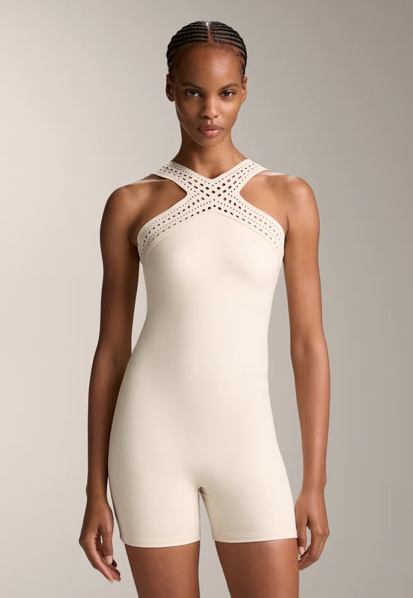 COMPRESSIVE CUTWORK  - Turnanzug - beige