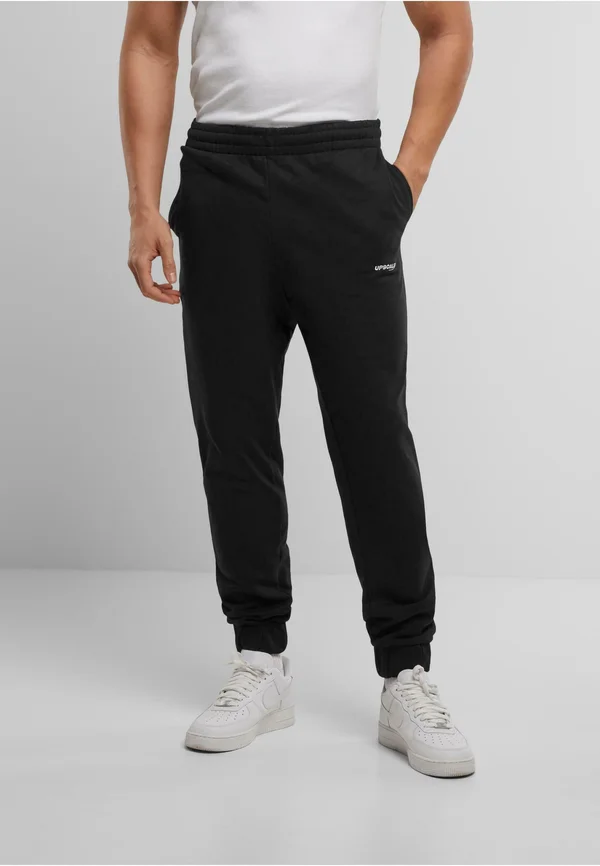 CORE EMB HEAVY  - Jogginghose - black