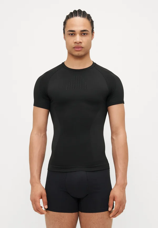 CORE SEAMLESS BASE LAYER - Unterhemd/-shirt - black
