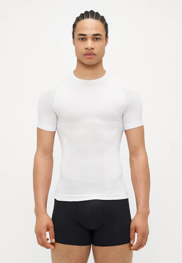 CORE SEAMLESS BASE LAYER - Unterhemd/-shirt - white