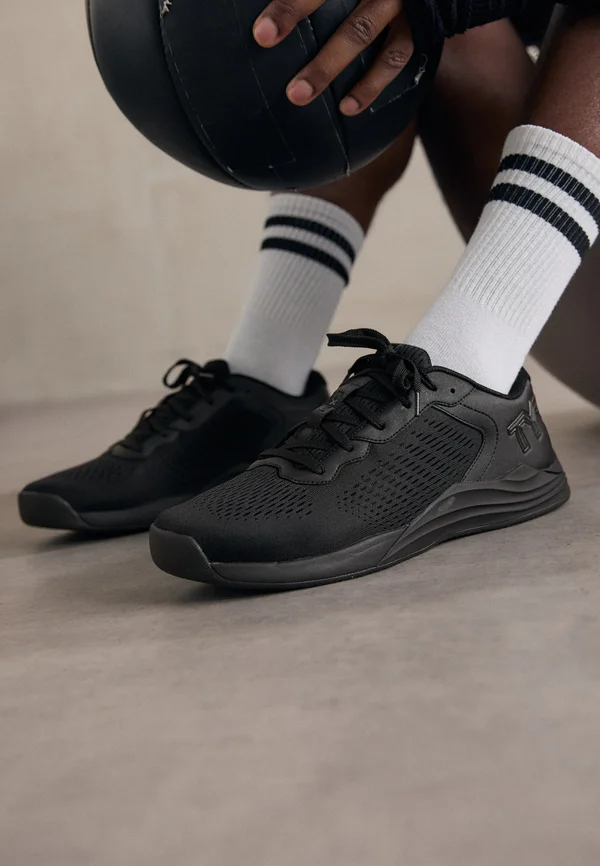 CXT1 TRAINER UNISEX - Trainingsschuh - black