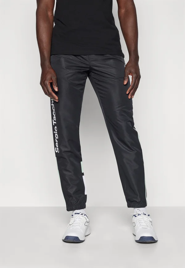 DENSO PANTS - Jogginghose - black/birds egg green