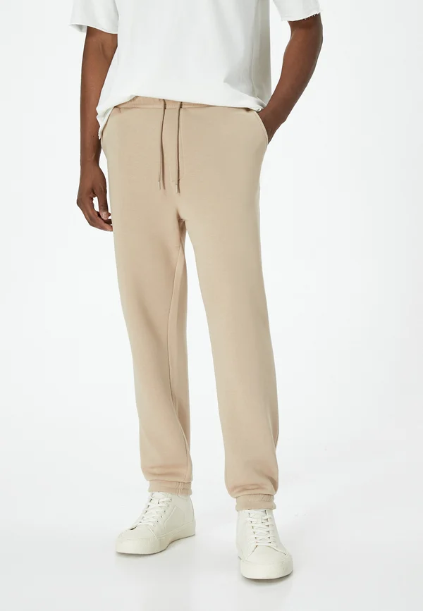 DRAWSTRING JOGGER - Jogginghose - beige