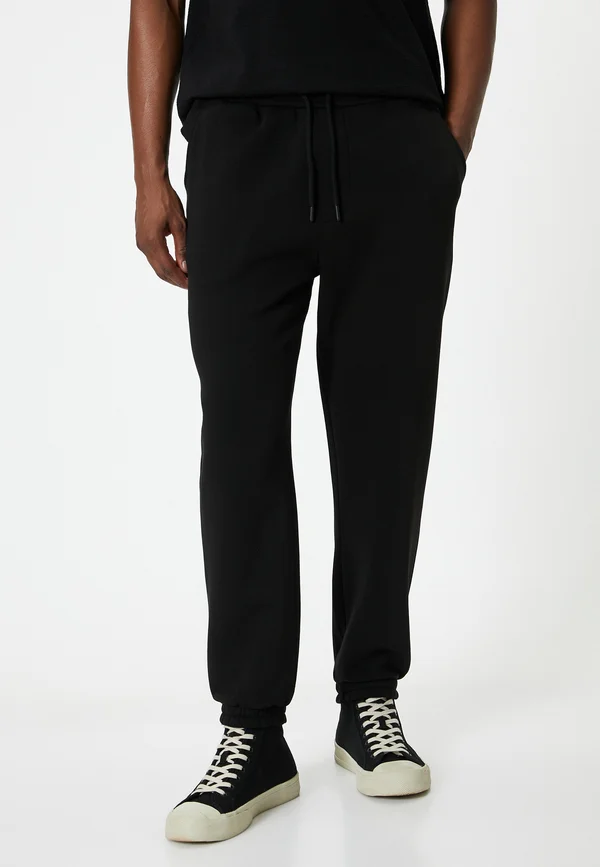 DRAWSTRING JOGGER - Jogginghose - black