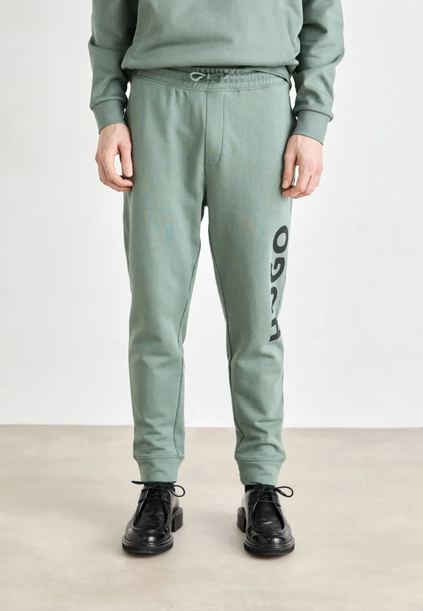 DUTSCHI - Jogginghose - open green