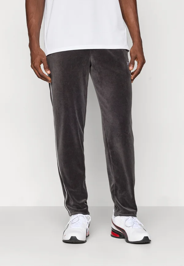 ELEVATED TRACK PANTS - Jogginghose - black