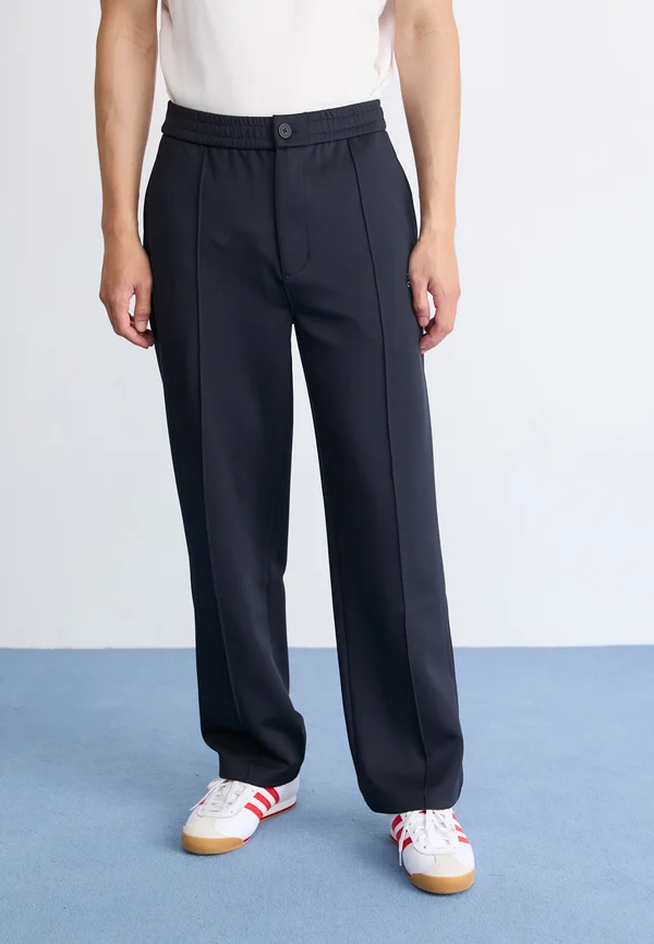 EMBLEM - Jogginghose - navy/pan africa