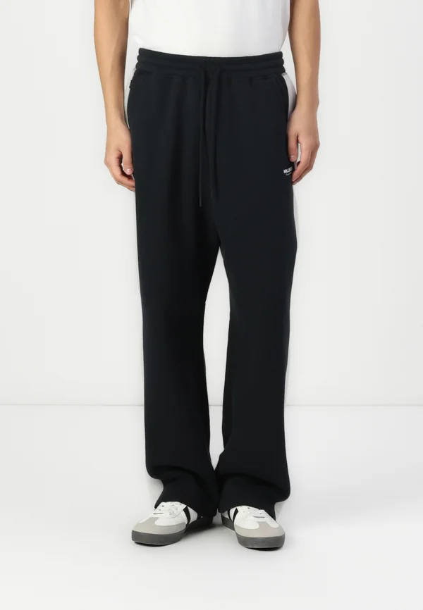 EMEA BAGGY VARSITY  - Jogginghose - black beauty/oyster mushroom