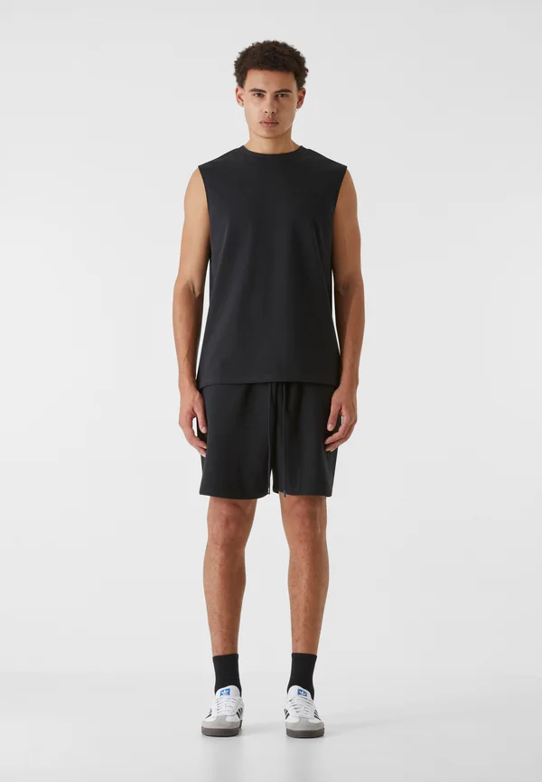 ESSENTIAL - Jogginghose - black