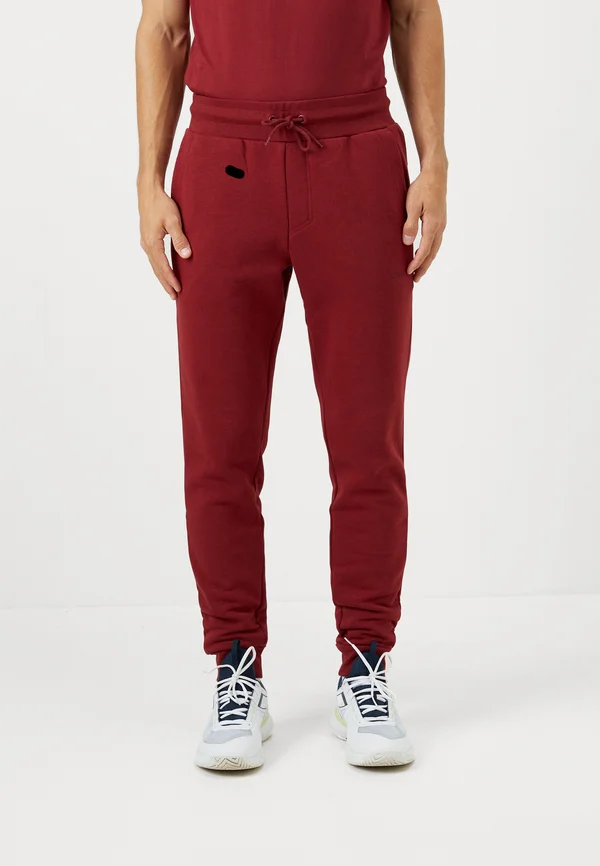 ESSENTIAL - Jogginghose - pomegranate