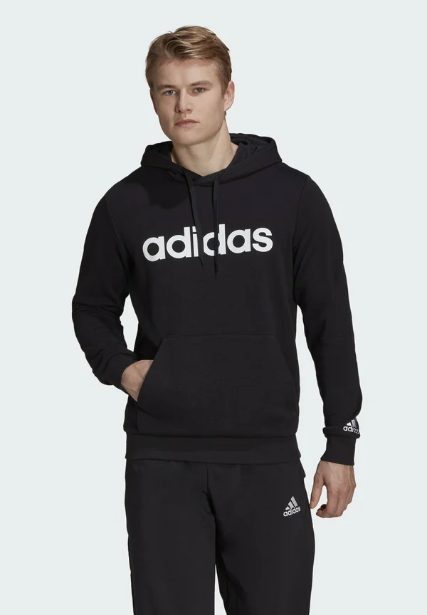 ESSENTIALS FRENCH TERRY LINEAR LOGO HOODIE - Kapuzenpullover - black