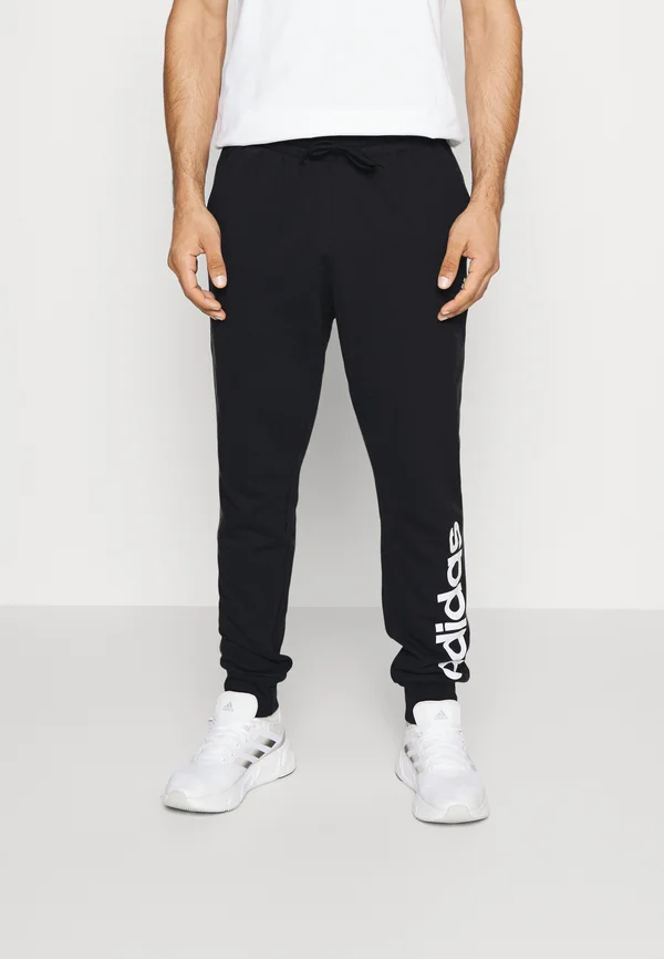 ESSENTIALS - Jogginghose - black